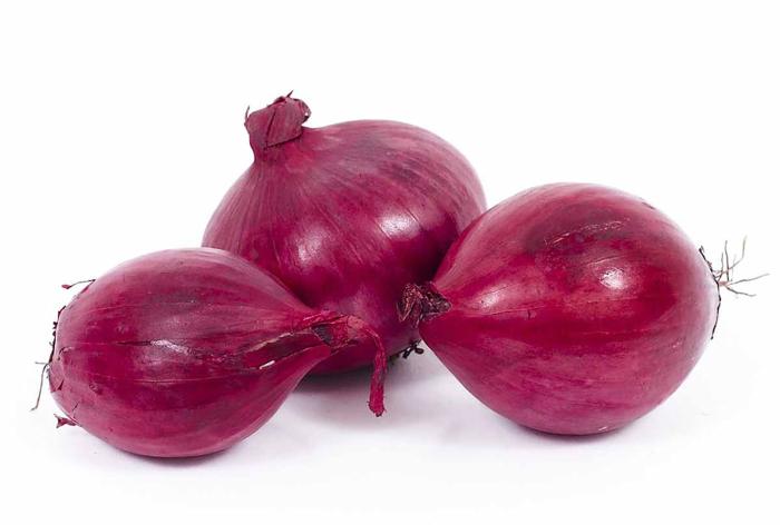 Фиолетовая или красная чешуя выделяют растение из семейства Луковых